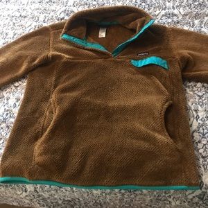 Brown and teal Patagonia fleece pullover